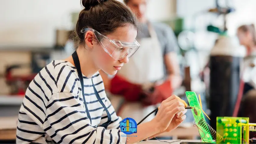 a person in safety glasses working on a project