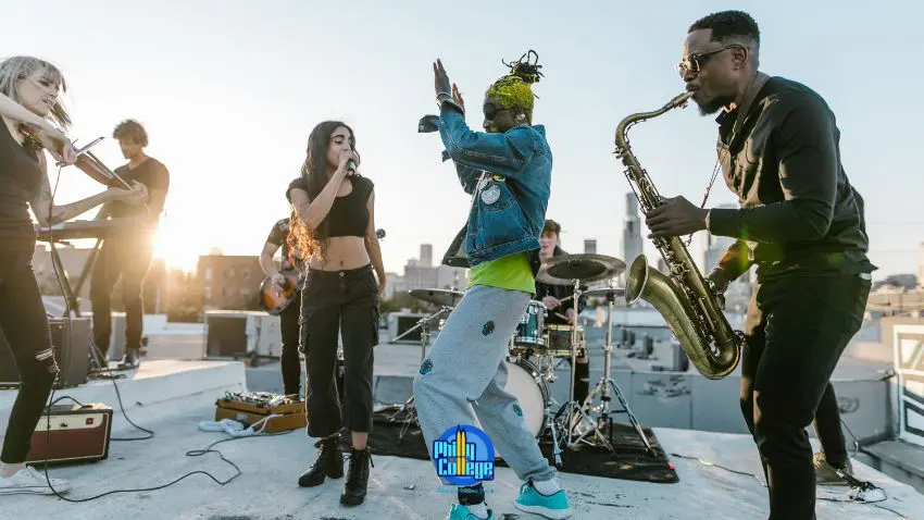a group of people playing music on a rooftop