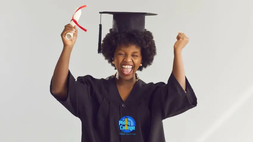 A person in a graduation gown is celebrating