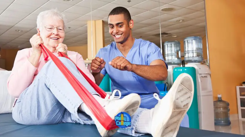 A physical therapist helping a woman with a resistance band