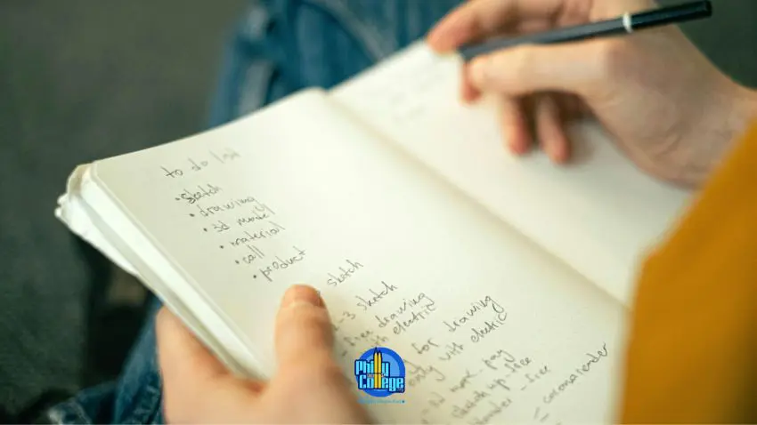 a person writing in a notebook