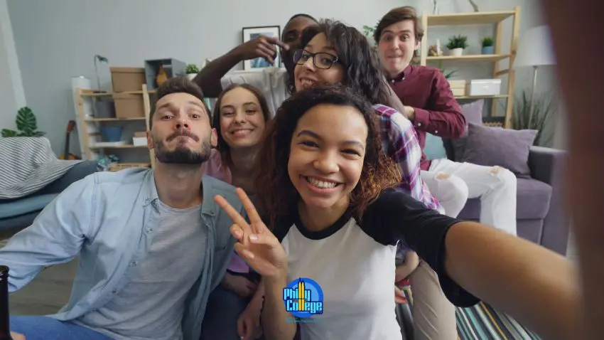 A group of people taking a selfie